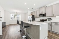 Building Photo - "Spacious 4-Bedroom Condo with 3.5 Baths in Prime Suffolk Location – 2081 Sq Ft of Comfort and St...