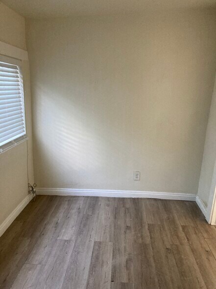 Building Photo - 8765 S San Pedro St