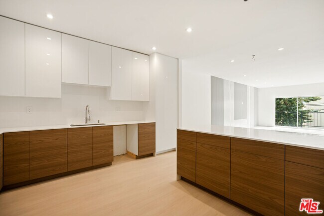 Building Photo - 10630 Wilkins Ave