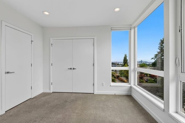 Building Photo - Air Conditioned Hilltop Gem w/ 360° Rooftop Ocean, Mountain and Skyline Views