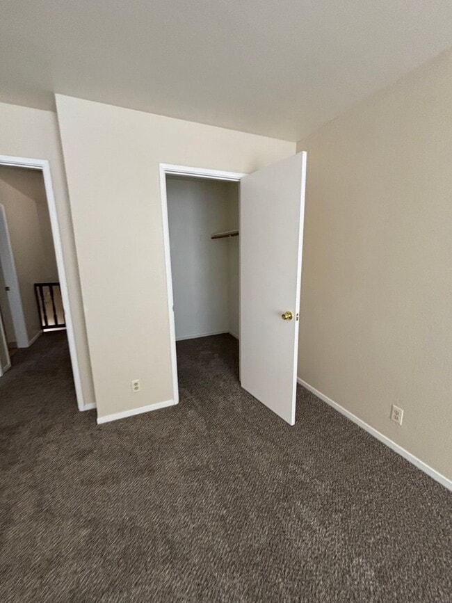 Building Photo - Spacious 4-Bedroom Home with Community Poo...