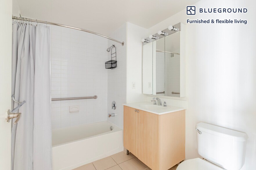 Building Photo - 4-75-75 48th Ave