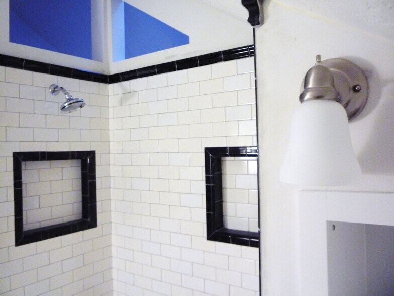 One of the (2) baths is very recent but still very vintage style - 851 E 3rd Ave