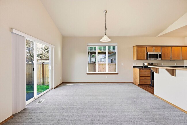 Building Photo - Vaulted Ceilings, A/C & Fully Fenced Yard – Beautiful 3-Bedroom Olympia Home!