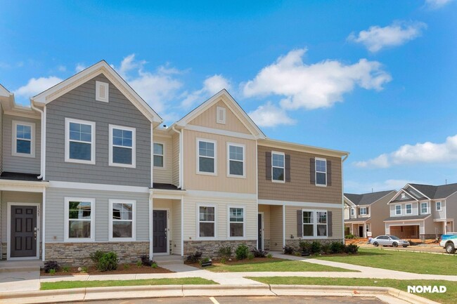 Building Photo - Brand New Charming 2 master BR Townhome in...