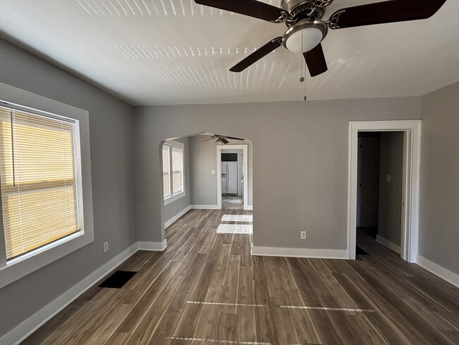 View through living room to dining room - 1555 S Gold St