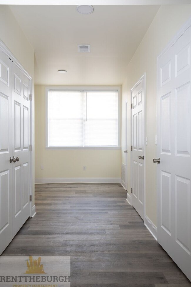 Building Photo - Updated 4BR House with 2 full baths and yard!