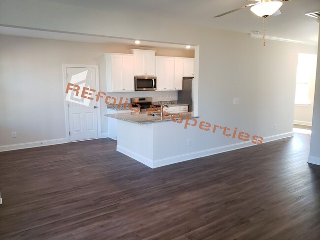 Building Photo - Charming 4 Bedroom, 2.5 Bath, 2-Car Garage...