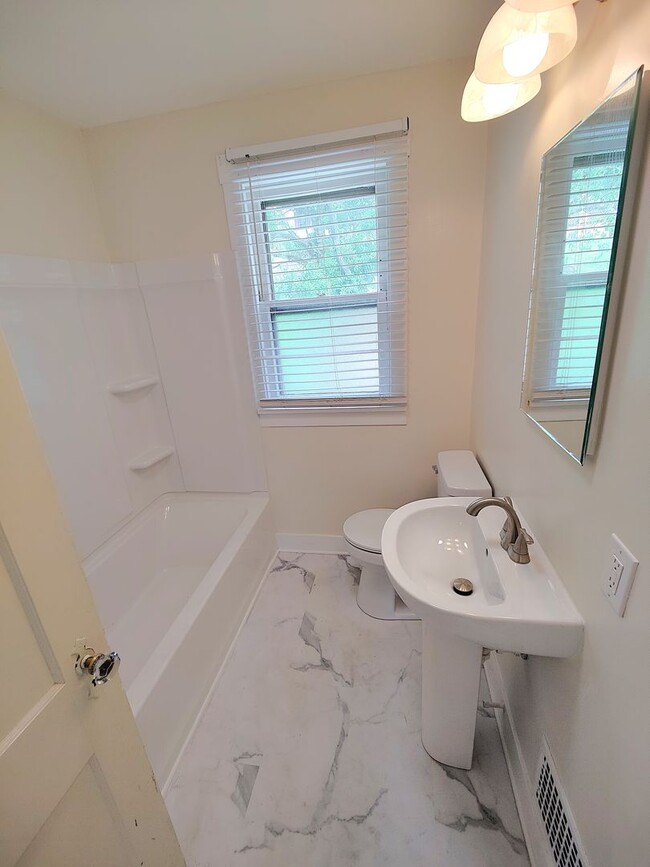 Building Photo - *Spacious & Updated 3BD/1BA Single-Family Home Available in Brookline*