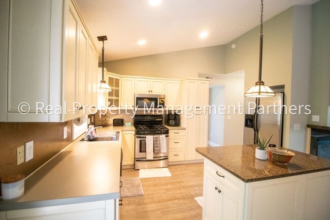 Building Photo - Spacious 3BR Townhome in Lowell | Nature Views & Maintenance-Free Living