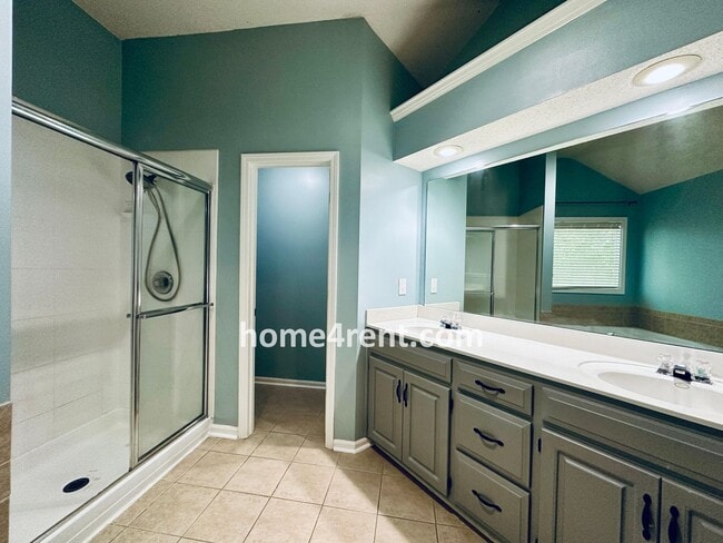 Building Photo - Blue Valley Schools w/ Wood Floors, Finished Basement and a Peaceful, Private Fenced Yard!