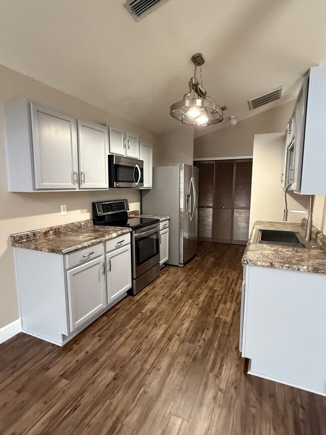 Building Photo - Pool home in Holiday Springs at Suntree