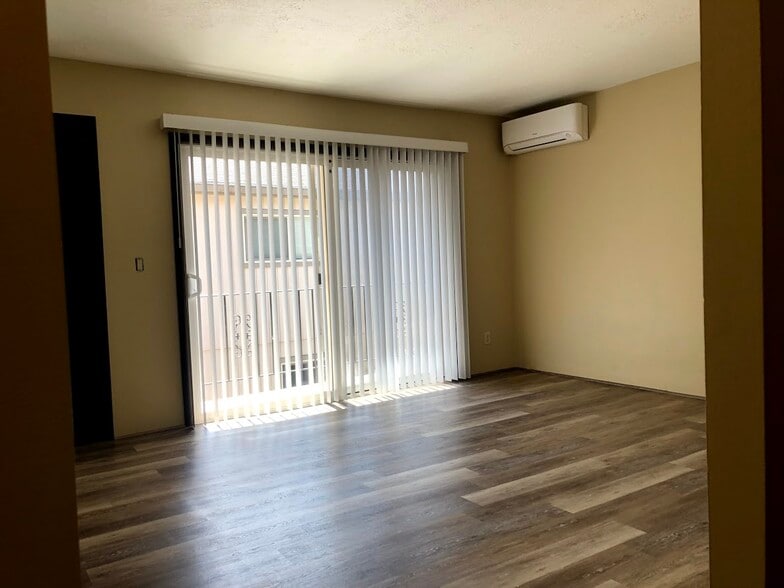 Living Room with balcony and A/C! - 3808 SE Cesar Estrada Chavez Blvd