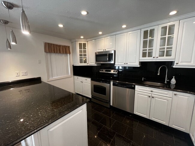 Building Photo - Available Now! 2-Bedroom, 2-Bath Condo in ...