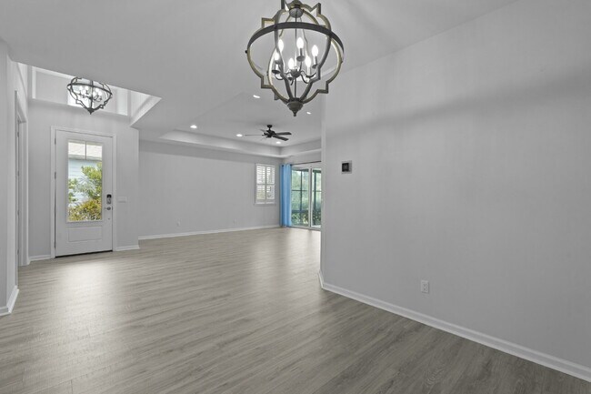 Building Photo - "Charming 2-Bedroom Retreat with 2 Baths and Den - 1558 Sq. Ft. of Comfort in Latitude Margaritav...