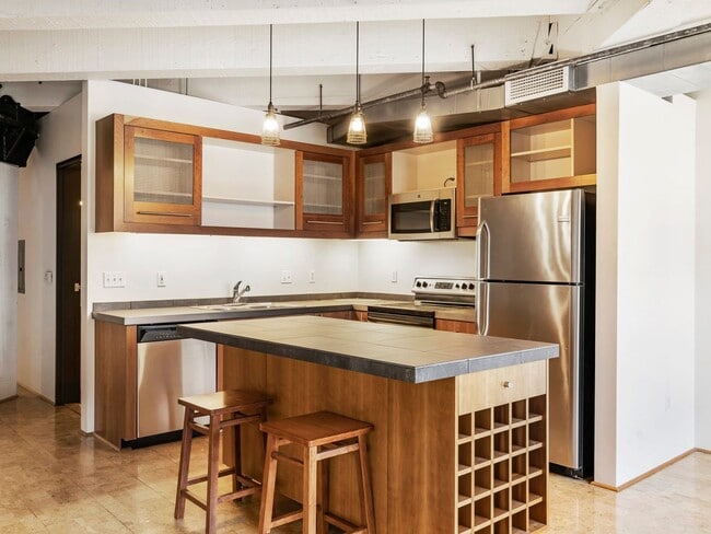 Building Photo - Marshall Wells - North facing Pearl District Loft w/parking/storage/ac