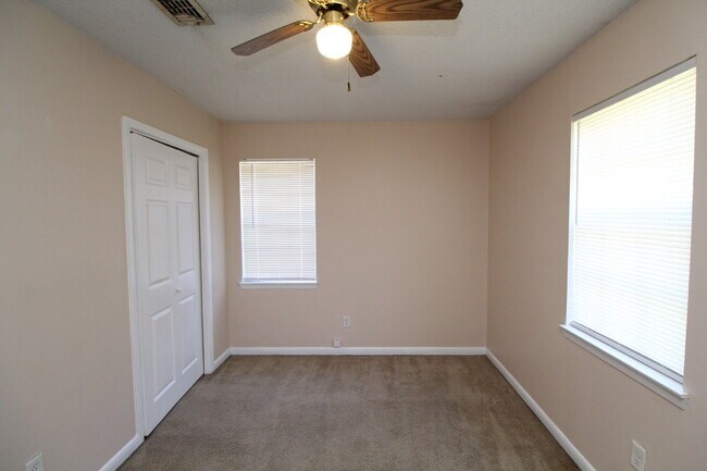 Building Photo - Quiet North Pensacola/Cantonment 2BR Brick Duplex on 1 Acre with Open Living Layout, Storage Room...