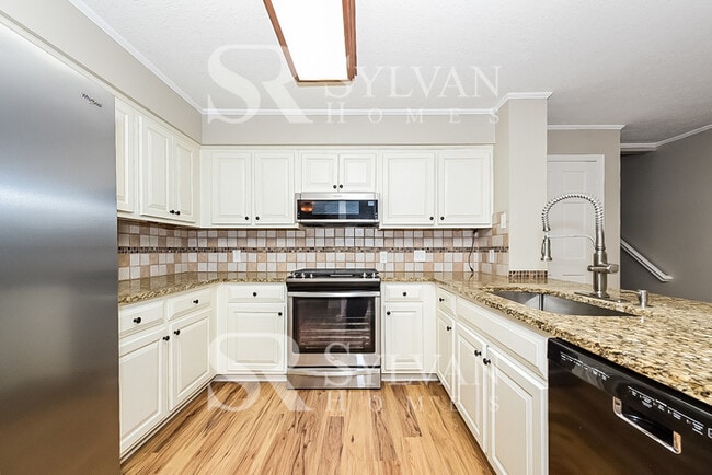 Building Photo - Turn the key. Enter. Smile. Repeat every day!