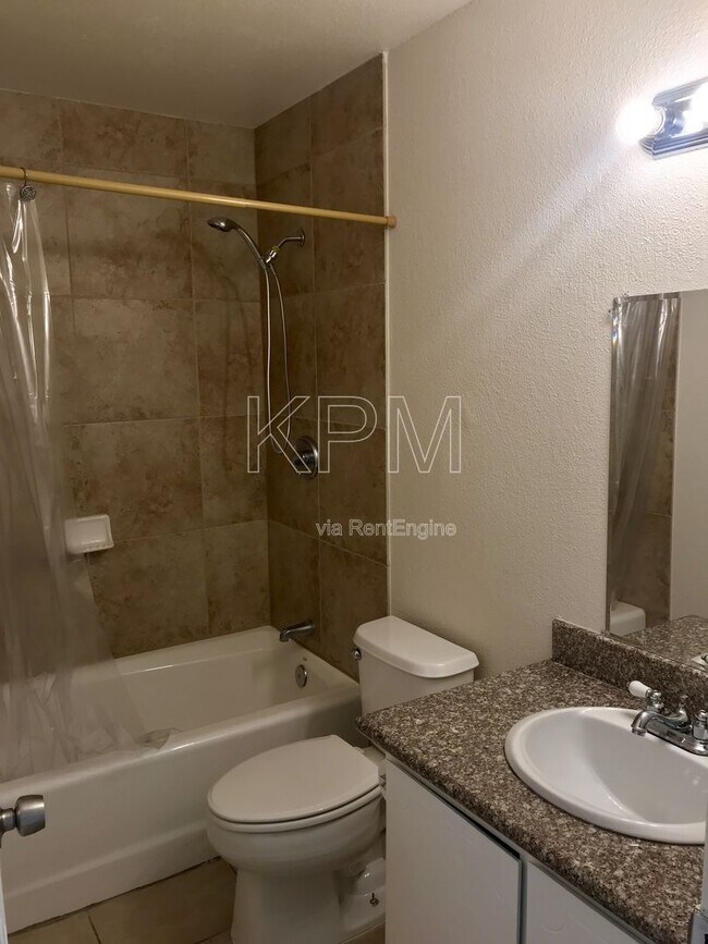 Building Photo - 7409 Village Green Dr