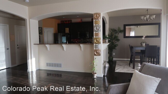 Building Photo - 4 br, 3 bath House - 7874 Pinfeather Dr