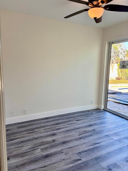 Building Photo - 5865 NW 125th Ave