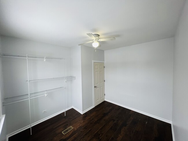 3rd bedroom exposed wardrobe - 4022 N Drake Ave