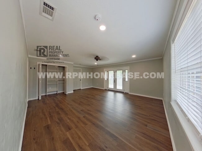 Building Photo - Spacious 4-Bedroom Home with Solar Panels ...