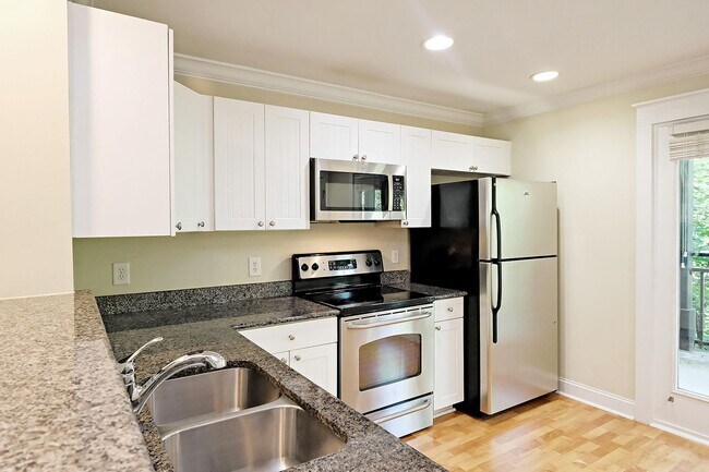 Building Photo - Student + Pet-Friendly Woodlands Condo with Community Amenities