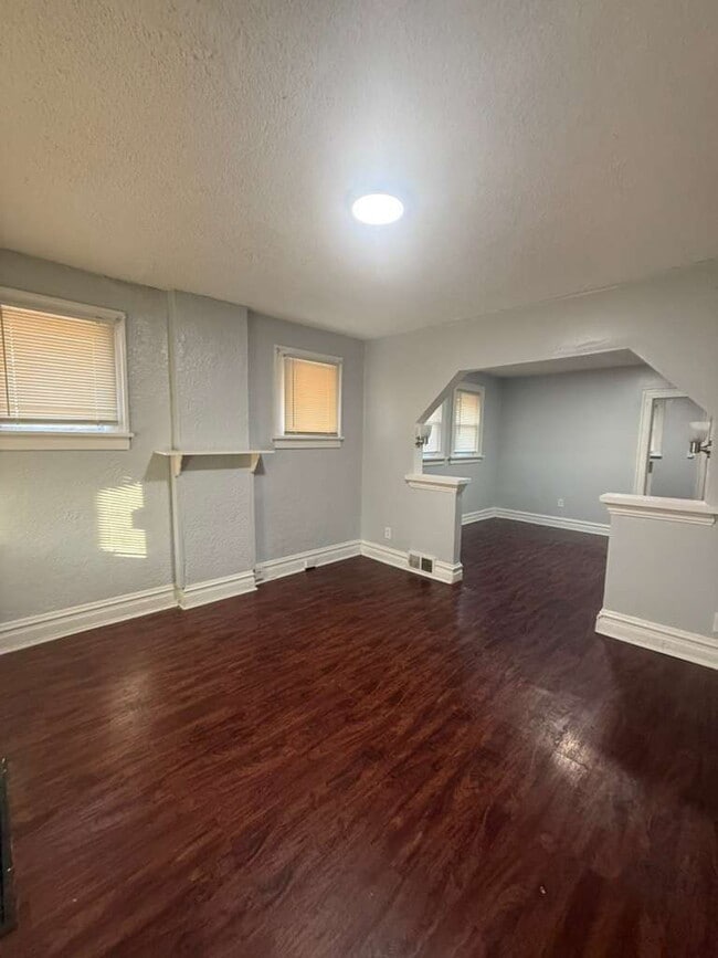 Building Photo - "Charming 2-Bedroom St. Louis Home with Gleaming Hardwood Floors in 63121!"