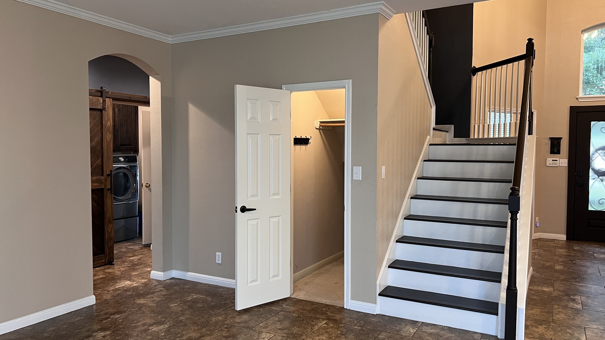 Coat closet/under stair storage - 18439 Rogers Bend