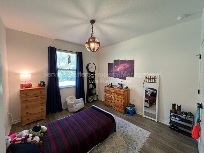 Building Photo - 4130 Lazy Breeze Ln