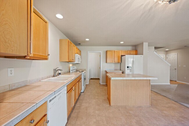 Building Photo - Beautiful 3-Bedroom Home in Cherry Creek School District with Fenced Yard & 2-Car Garage