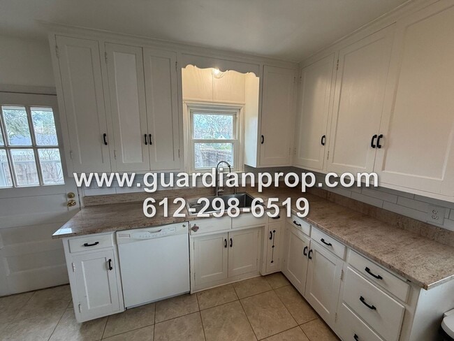 Building Photo - Highland Park House Available Now On Corner Lot, HW Floors, Updated Bath, Fenced Yard, 2 Car Garage