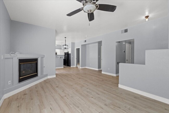 Building Photo - Sleek 2 Bedroom Condo with 2 Car Garage Ne...
