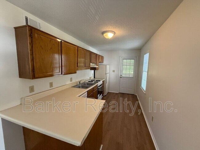 Building Photo - 6112-D Spice Ridge Lane