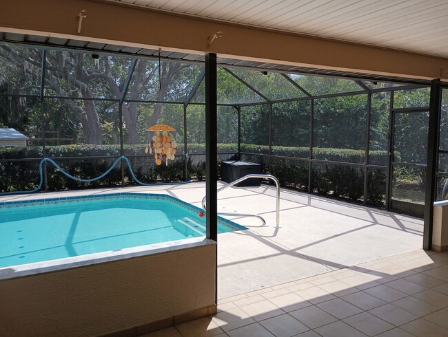 Building Photo - 3 bedroom 2 bathroom 1948 Sq ft Pool Home ...