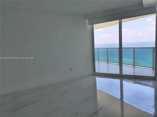 Building Photo - 19111 Collins Ave