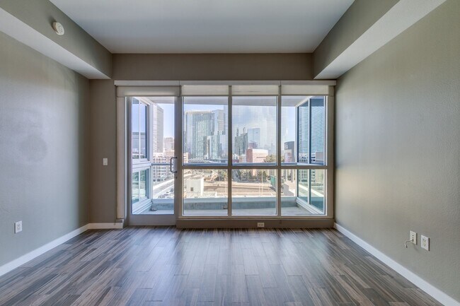 Building Photo - Iconic Strip-View Luxury | Elegant 1BR + Den High-Rise Residence
