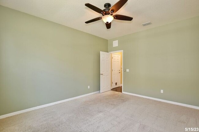 Building Photo - Gorgeous 4/3.5 Home with a Large Fenced Ba...