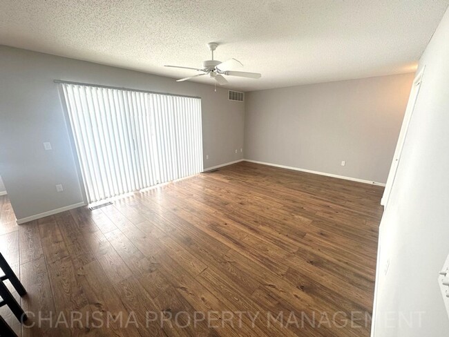 Building Photo - WALK IN LEVEL 2 BD, 1 BA CONDO WITH WOOD F...