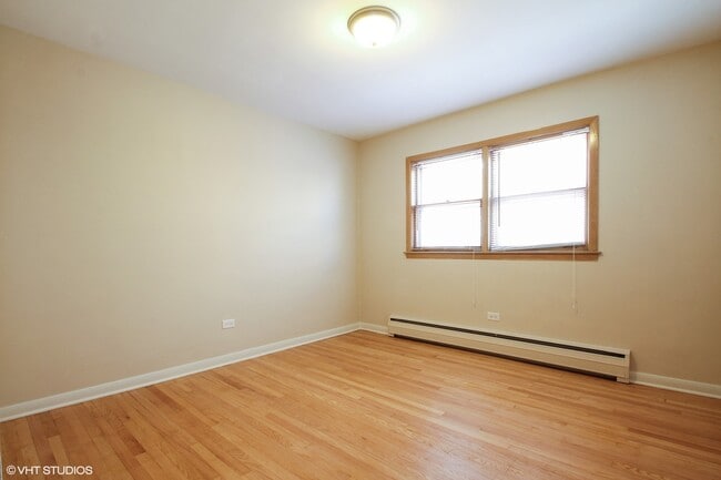 Building Photo - 8317 W Summerdale Ave