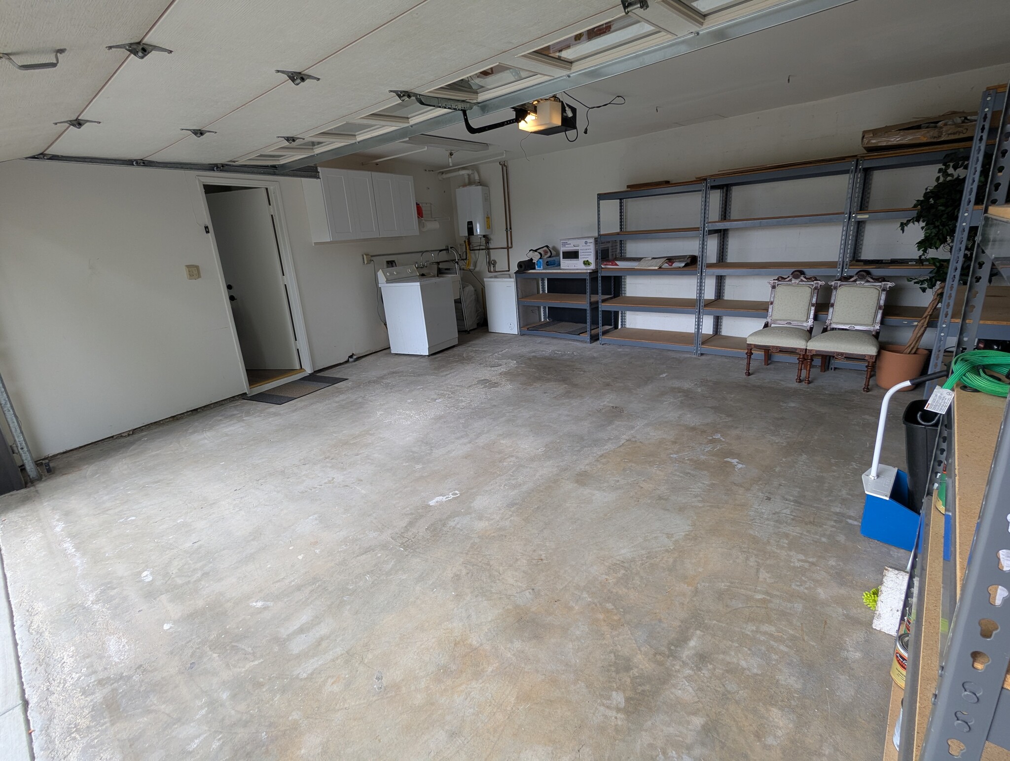 Garage is large and clean with shelving included - 1868 Kaweah Dr