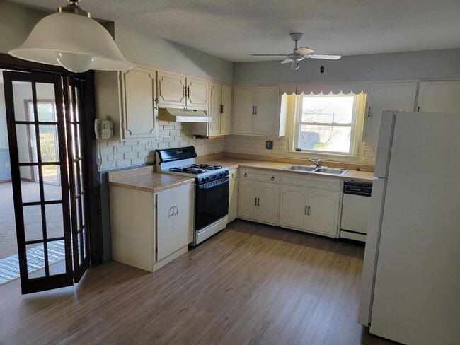 New Vinyl Flooring in Kitchen & Bathrooms - 2504 Crescent Dr