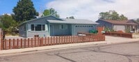 Building Photo - Updated 3 bedroom with A/C and Yard