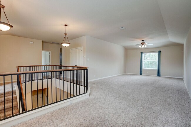 Building Photo - Bright & Roomy 4BR • 2.5BA • Two-Level Living