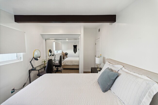 Work and unwind! This bedroom features a cozy workspace, perfect for productivity and relaxation - 9853 Saint George St