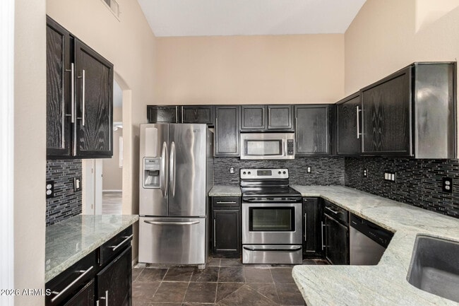 Building Photo - 8642 W Laurel Ln