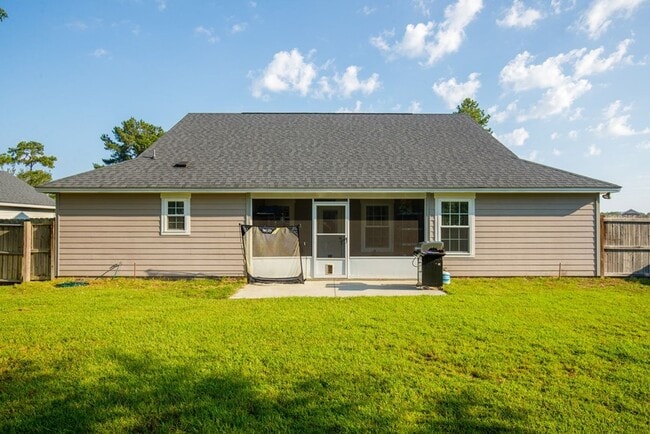 Building Photo - Modern 4-Bedroom Home with Screened Porch ...