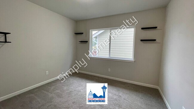 Building Photo - Step Inside to this Home with Spacious & Flexible Living!