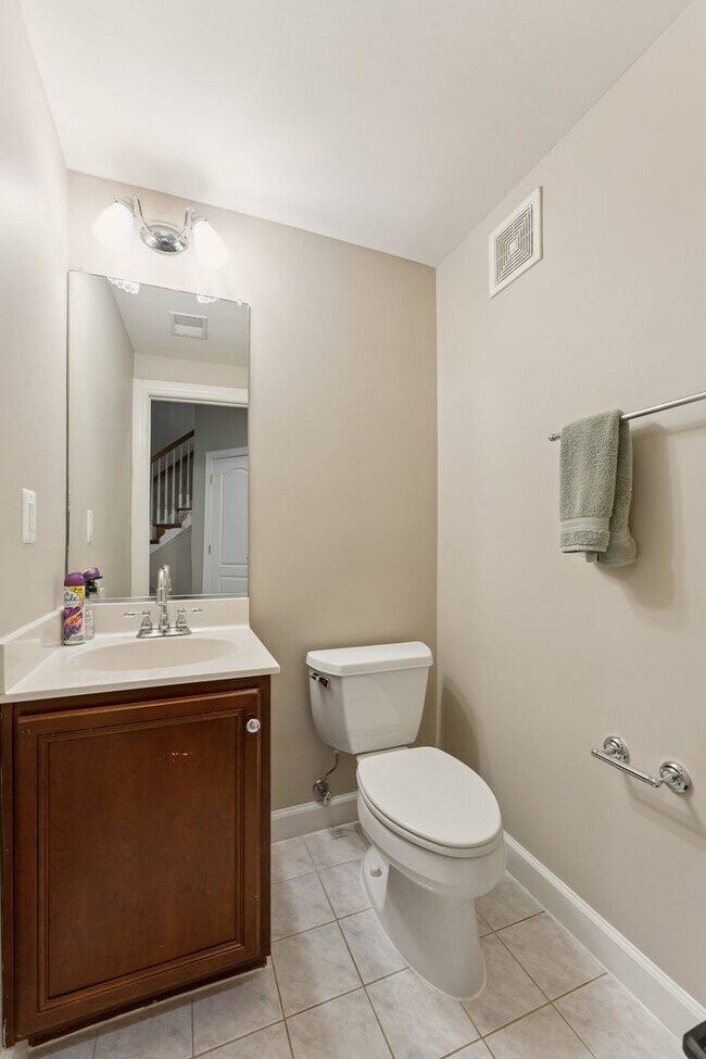 Building Photo - Discover this stunning four-level townhous...